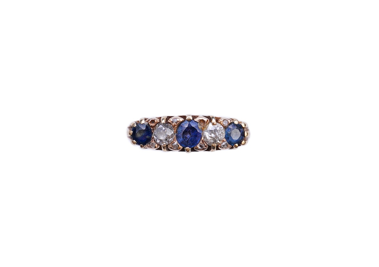 A sapphire and diamond five-stone ring, circa 1902